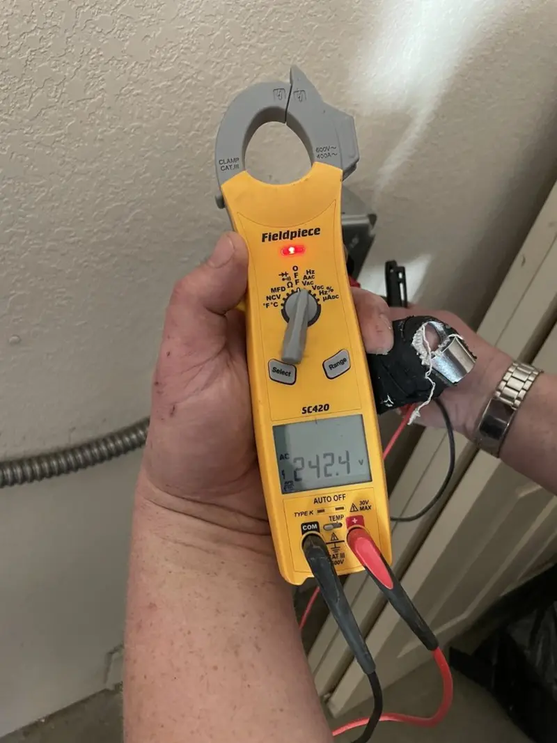 Voltage testing with clamp meter during Aluminum Wiring Replacement in Bennington